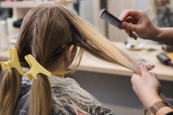 blonde-girl-getting-her-hair-done