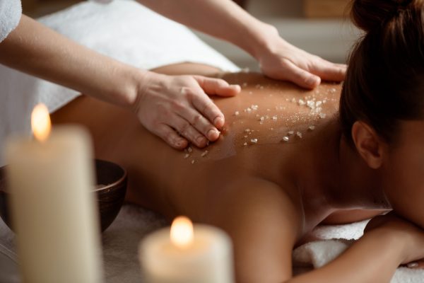 Young beautiful girl relaxing in spa salon.